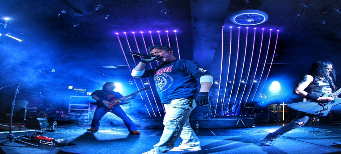 A live concert on stage at Namuai Live Hall, blue stage lighting